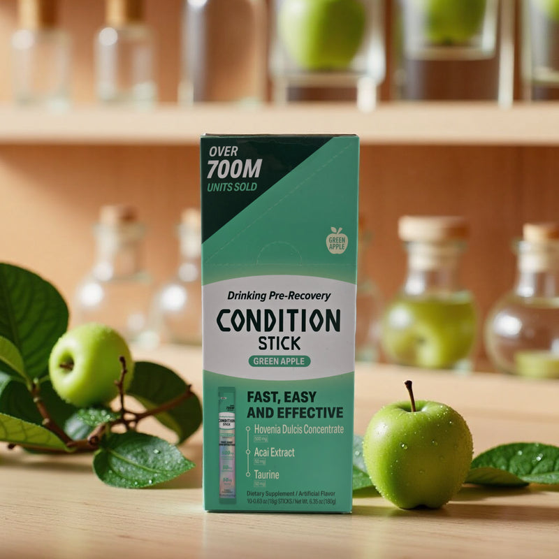 Condition Stick packaging with green apples on a wooden surface